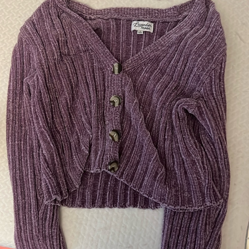 Purple slightly cropped sweater.